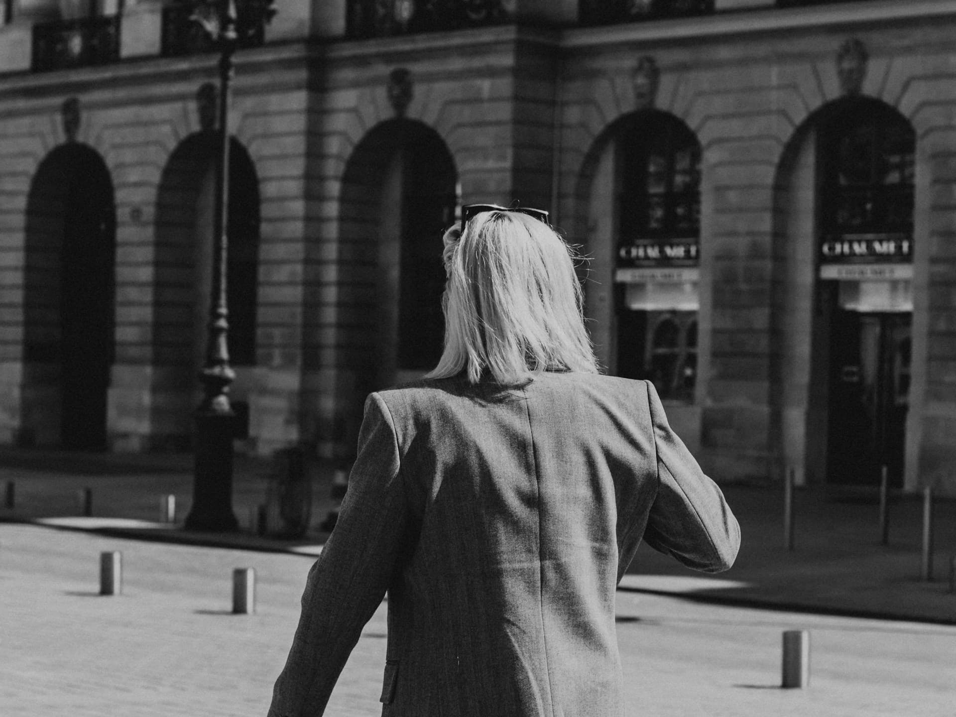 woman walking in blazer